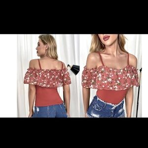Off the shoulder coral and floral top. Lightweight material in Medium